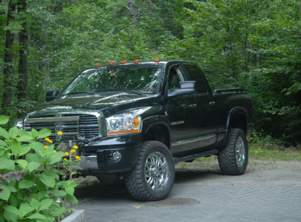 Big black truck and flowers